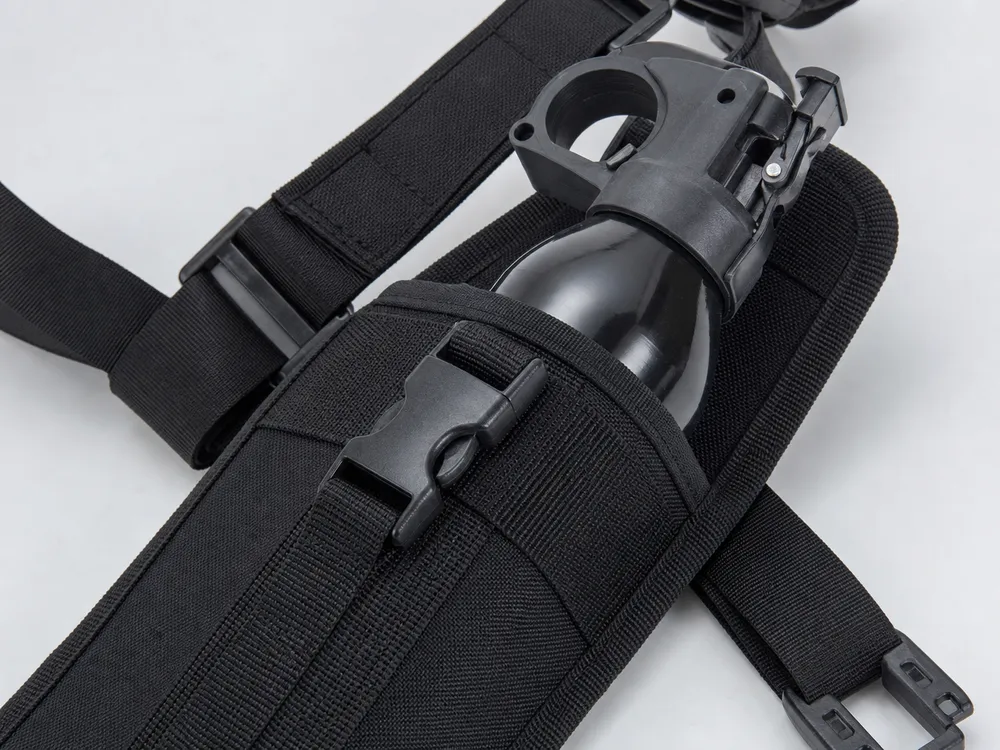 Bear spray chest holster detail — 600D polyester body, nylon webbing straps, UV-stabilized ABS hardware