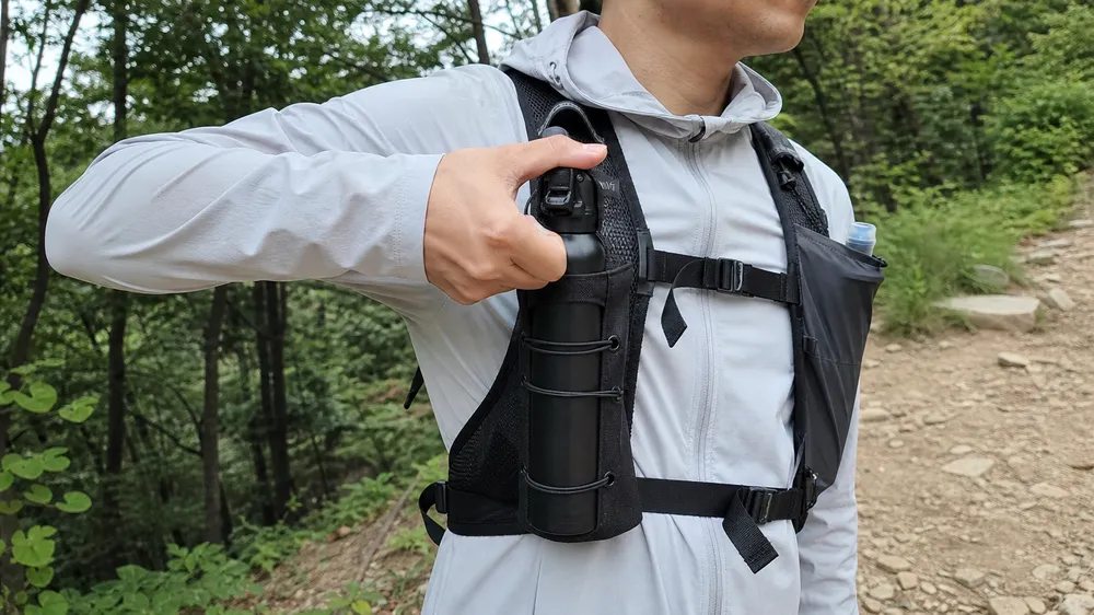 Bear spray holster for trail running — lightweight elastic retention single-hand release