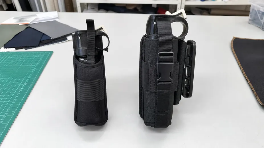Running holster design brief — minimal elastic retention versus hiking holster with rotational clip and secondary strap
