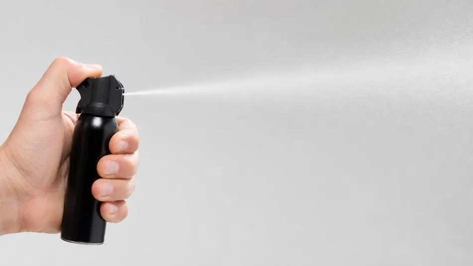 Stream configuration bear spray showing directional discharge pattern for security and law enforcement channels