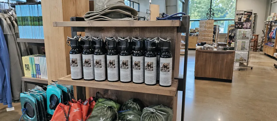 National park gateway retail store stocking grizzly bear spray near Yellowstone