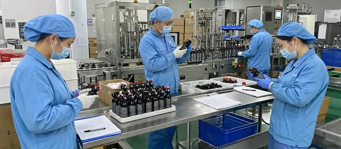 SOHAPI bear spray production floor showing in-process quality control checkpoints