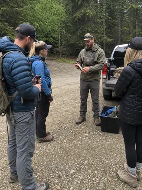 Hunting outfitter and guide service conducting client bear spray training before field entry