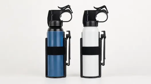 Training bear spray SKU pairing with matching live product — same canister configuration across both units
