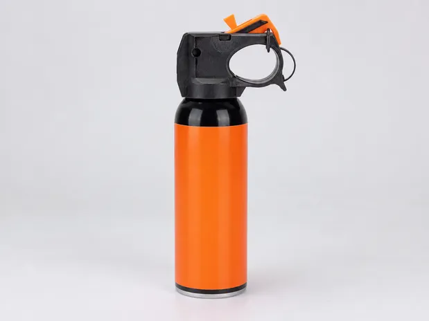Training bear spray canister with orange label — inert, matched to live product dimensions and valve assembly
